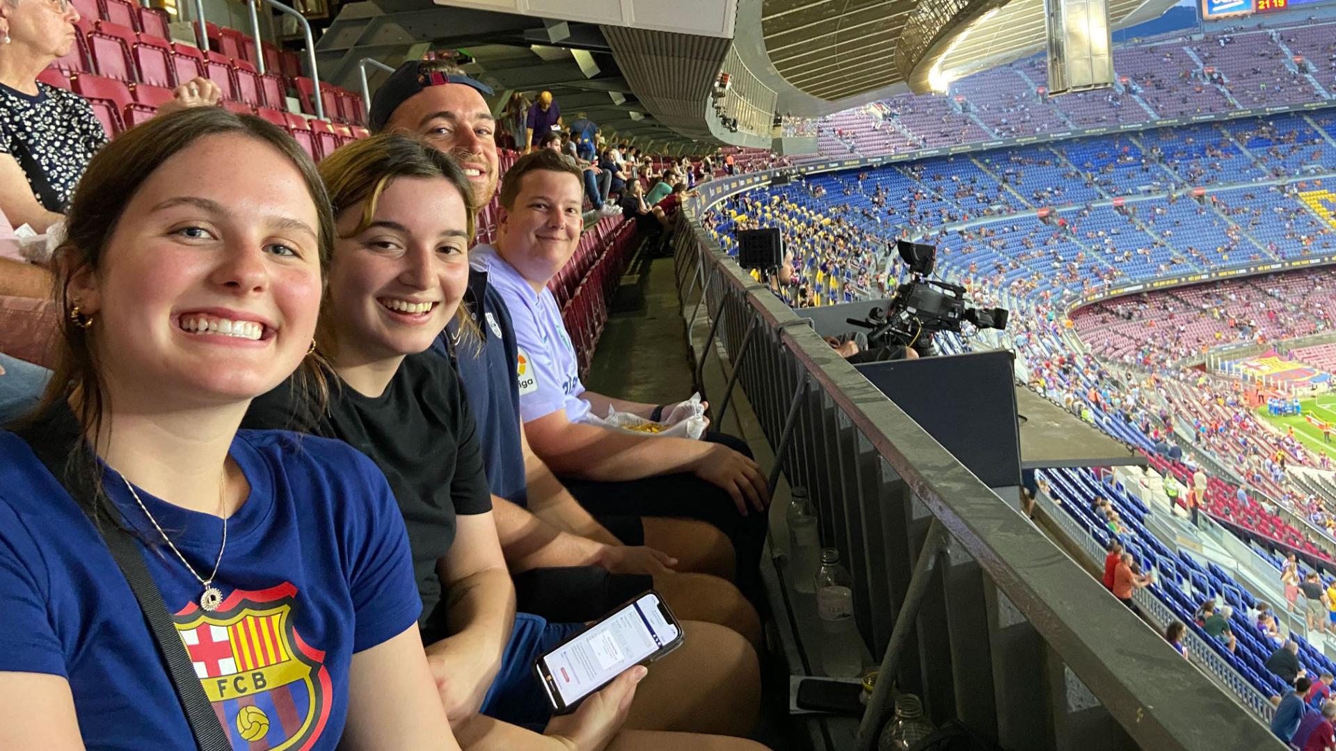 Student attend soccer game in Spain. 