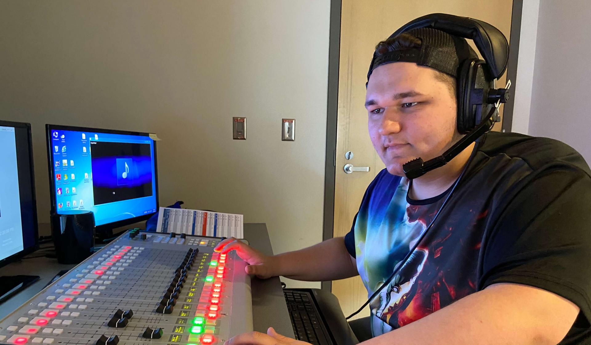 Student works in audio booth