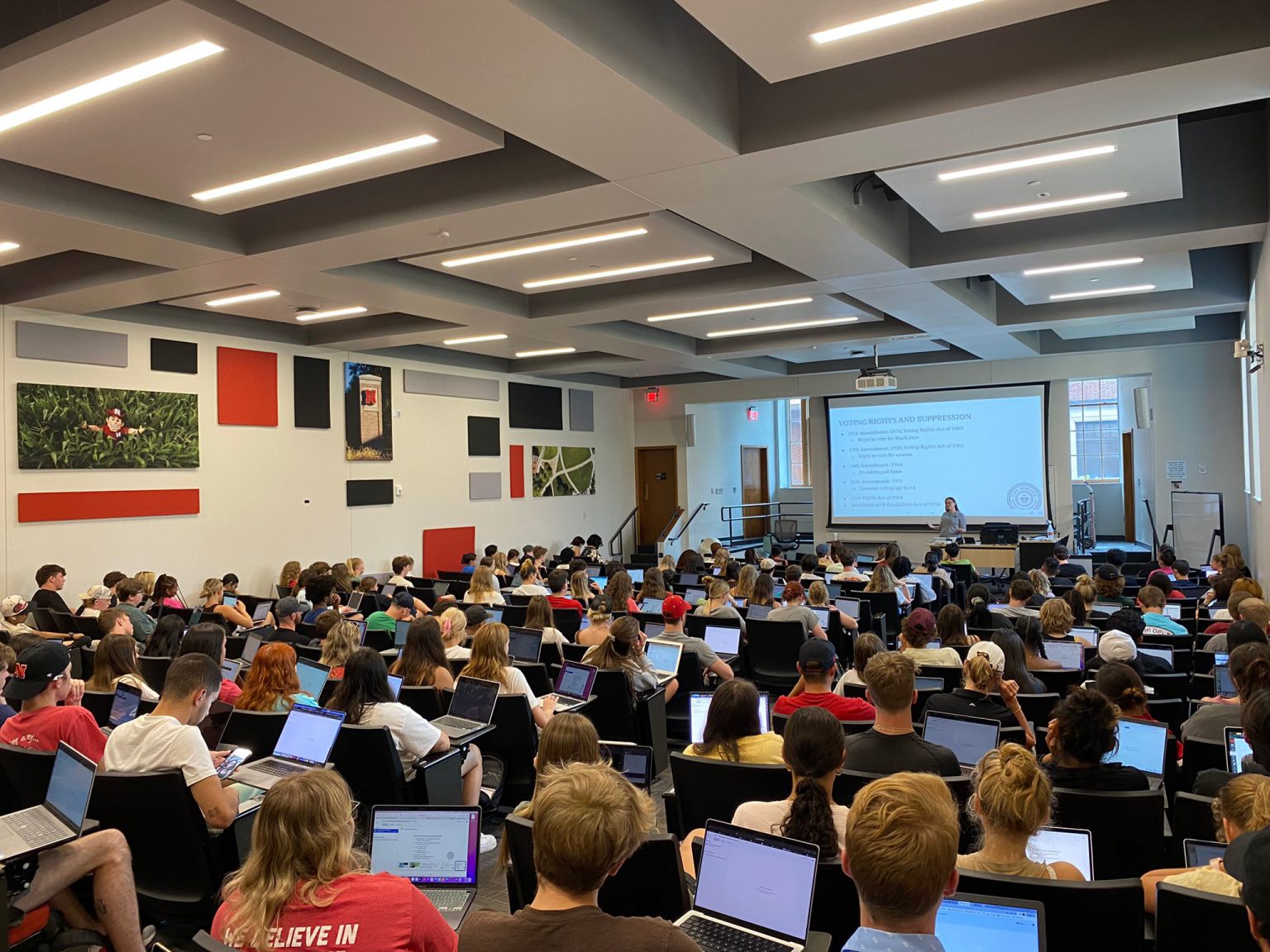 Heather Engdahl of Civic Rights Nebraska speaks to 250 students in UNL's College of Journalism and Mass Communications about voting rights, the importance of voting, voter suppression, gerrymandering and making a voting plan (Photo courtesy of Kelli Boling).