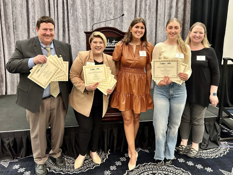 From Left: Assistant Professor of Practice Ken Fischer, Assistant Professor of Practice Kaci Richter, junior broadcasting major Alaina Tomesh, junior broadcasting major Avery Lewis and Assistant Professor of Practice Jill Martin accept the College of Journalism and Mass Communications Mark of Excellence Awards at the Midwest Broadcast Journalists Association Conference on March 31, 2023, in Minneapolis, Minnesota. 