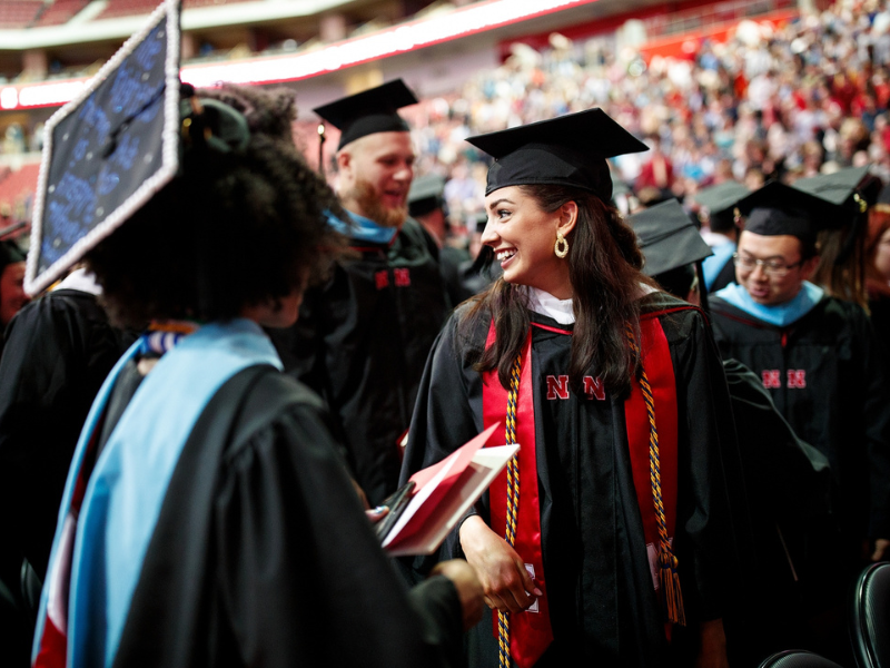 College of Journalism and Mass Communications Master of Arts graduate at commencement ceremony in Pinnacle Bank Arena.