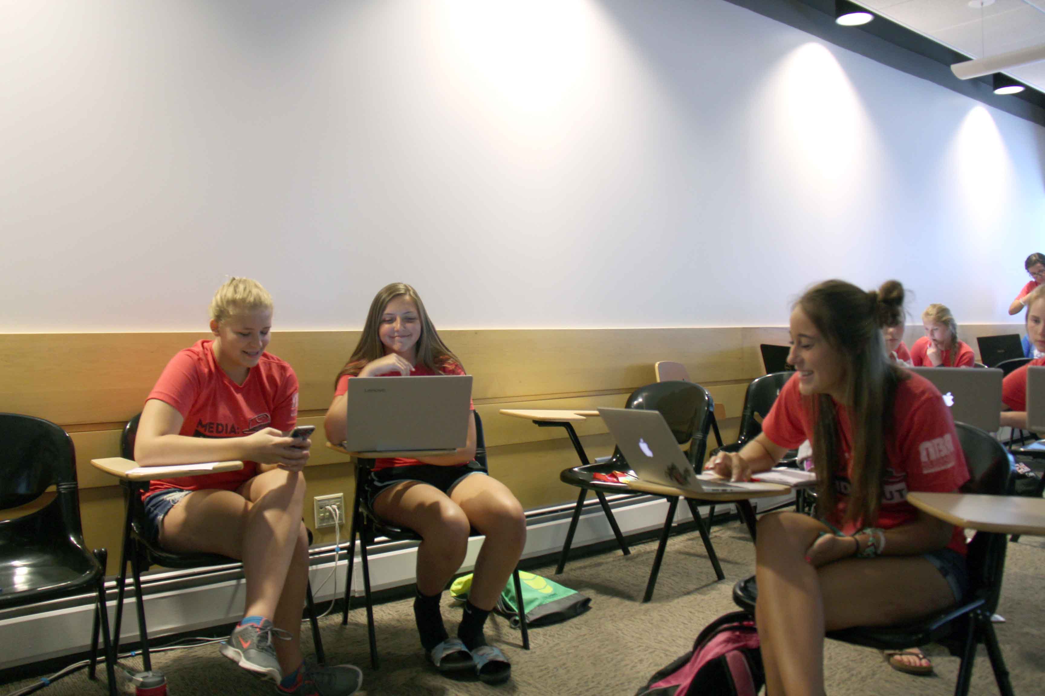 NHSPA Summer Journalism Workshop students work on a group project in the Yearbook Production class
