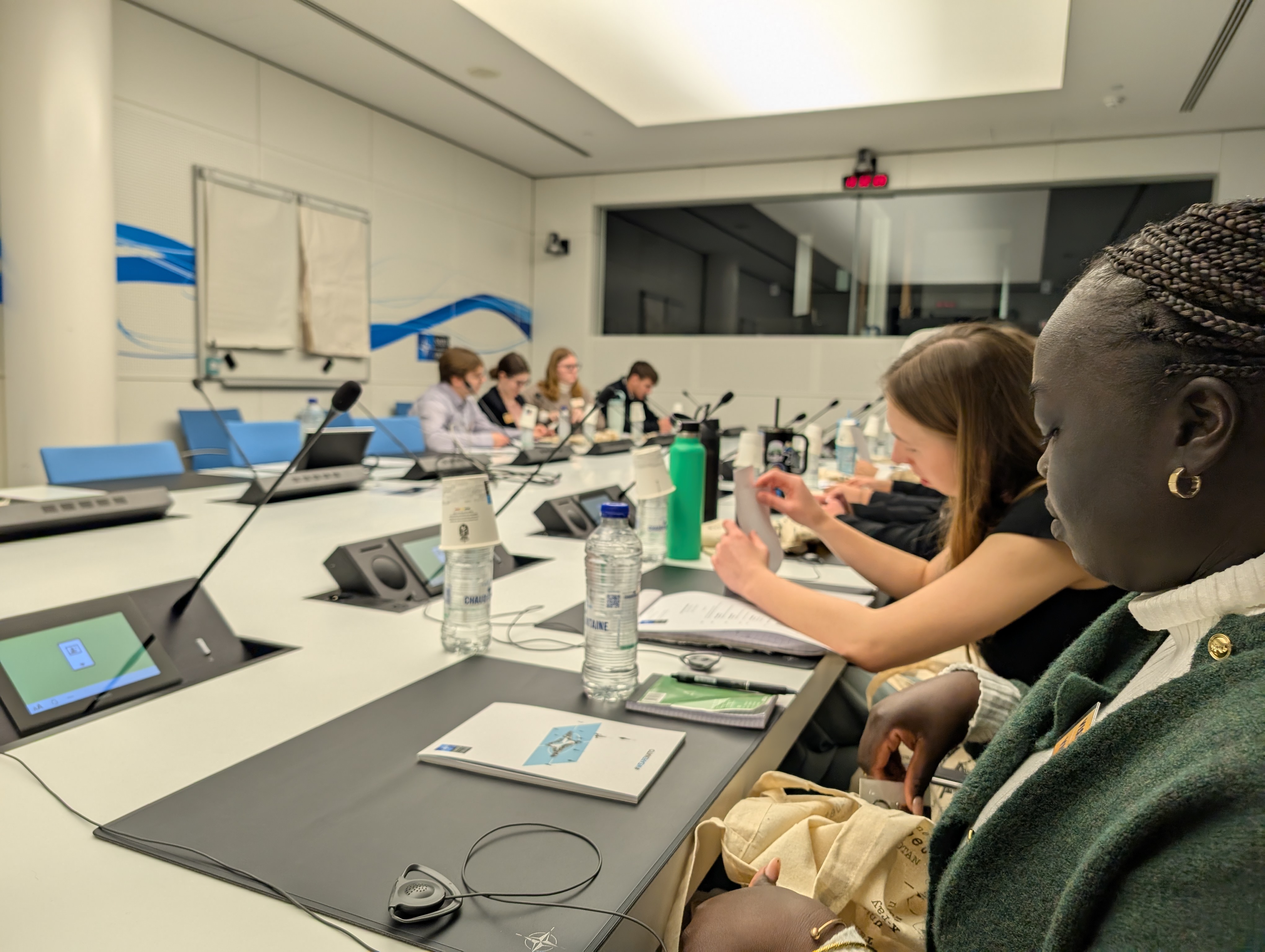 student at desk in NATO