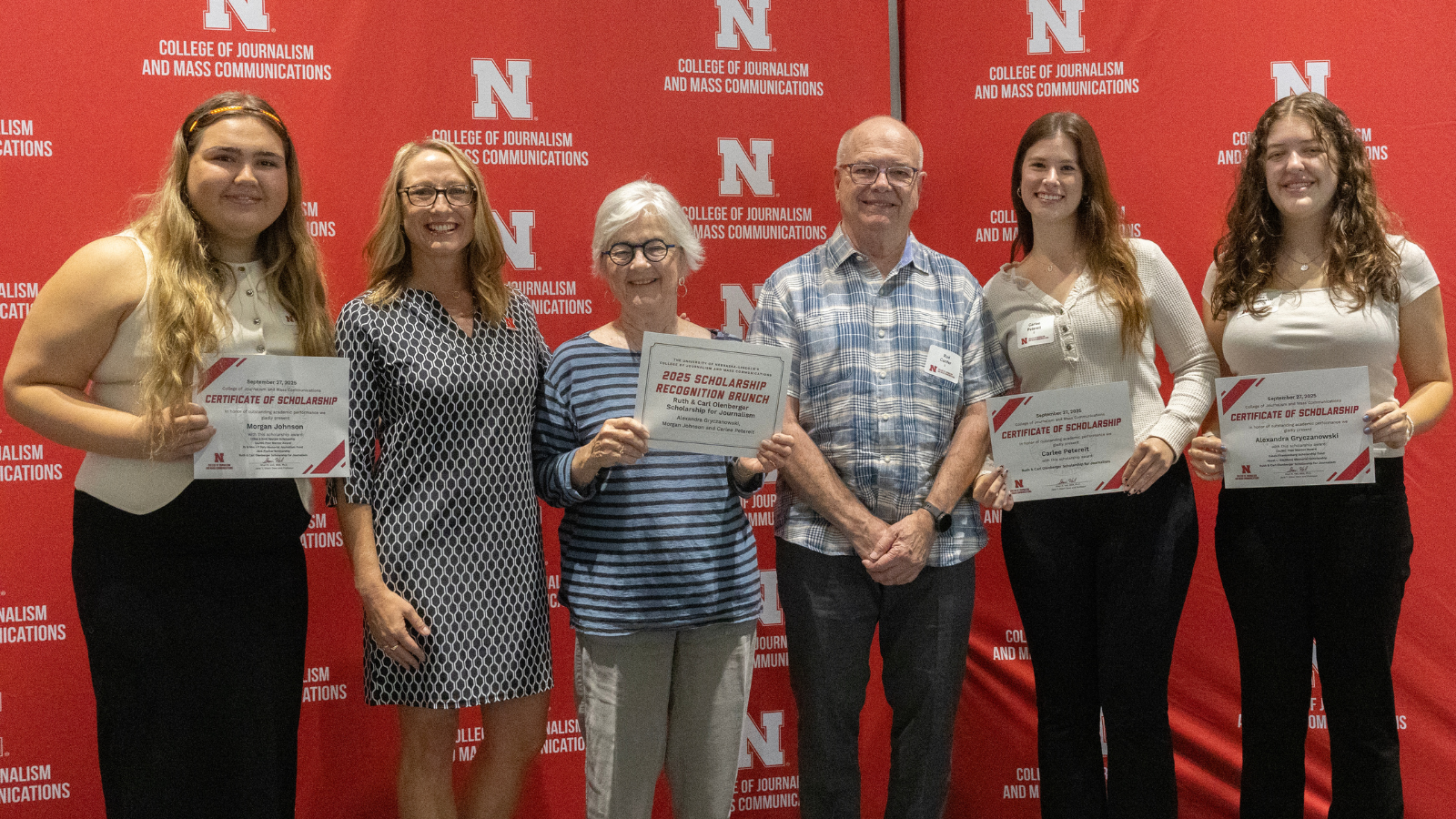 Recipients of the Ruth & Carl Olenberger Scholarship pictured with scholarship donors and Dean Veil.