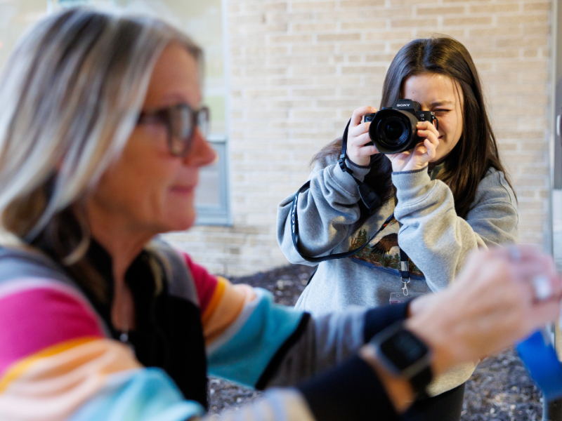 student taking photo