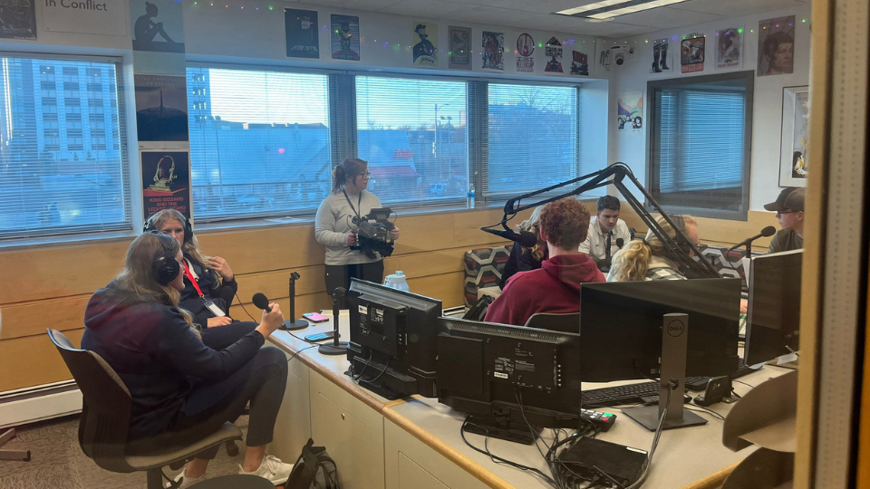 Unlimited Sports students interview high school basketball players in the 90.3 KRNU studio during a Media Days event this fall.