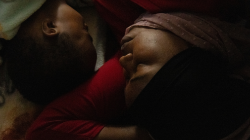 Aisha Ibrahim, right, comforts her son, Bugala Abdul, left, as she settles him down for his afternoon nap on Saturday, Feb. 23, 2025, in Lincoln, Neb. Ibrahim traveled to Nebraska to rejoin her husband, Abdul Atif Isaac, from the Kakuma Refugee Camp in Kenya in 2021. Her family is originally from the Al-Jenina, Sudan but fled to the Kakuma Refugee Camp to escape war in Sudan. 