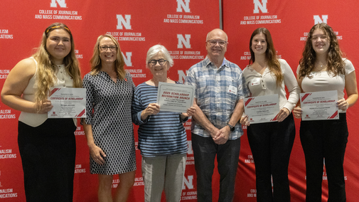 Recipients of the Ruth & Carl Olenberger Scholarship pictured with scholarship donors and Dean Veil.