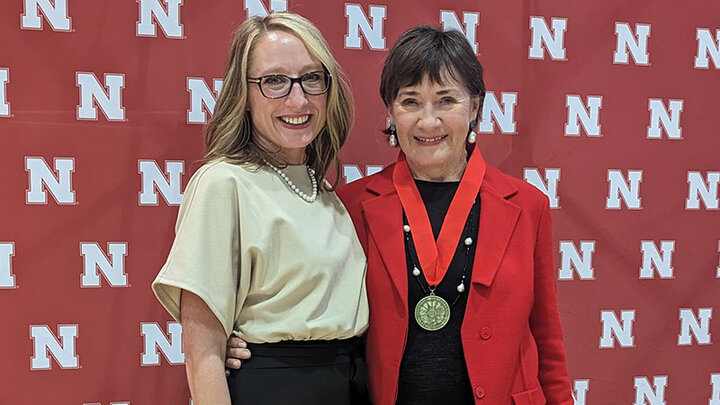 Dean Shari Veil stands next to Jane Olson