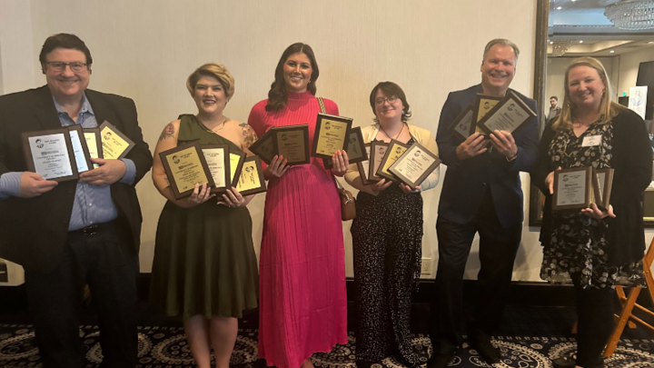 Six people hold awards