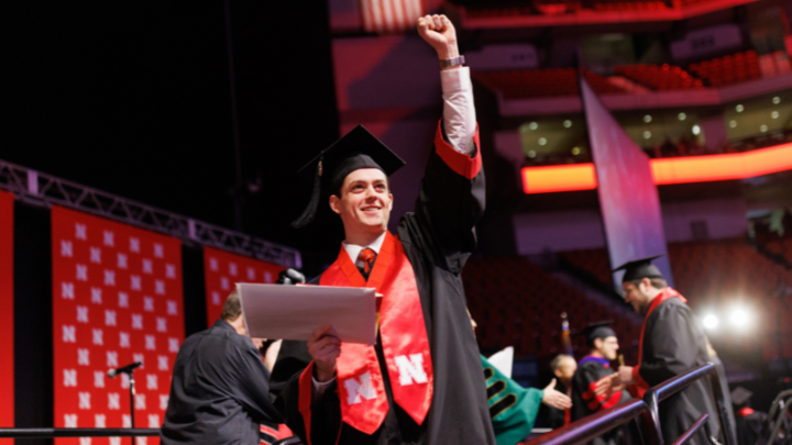 Ryan Yetts (â22) celebrates getting his degree at Pinnacle Bank Arena in Dec. 2022. The arena will host a combined graduate and undergraduate commencement ceremony Aug. 17.