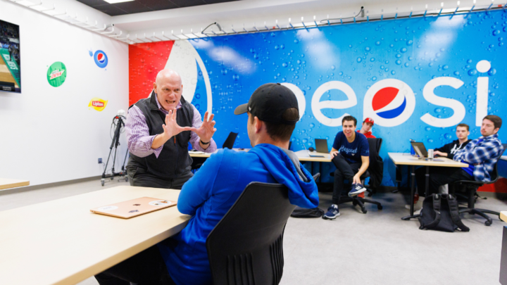 John Shrader teaches class in the Pepsi Unlimited Sports Lab.