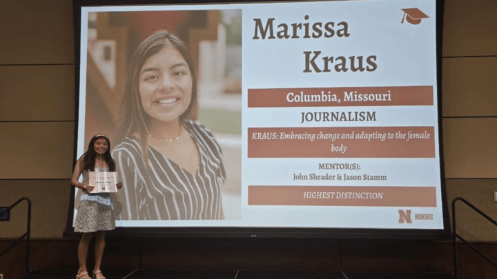 Marissa Kraus getting her honors certificate.