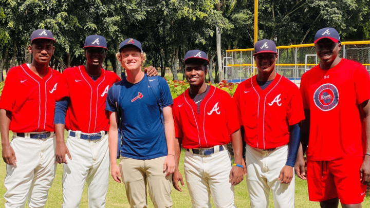 Ryan Taylor poses with the Atlanta Braves' minor league team. Taylor, a former CoJMC graduate from the University of Nebraska-Lincoln, scouts baseball prospects in the Dominican Republic and joined the Braves in 2020.