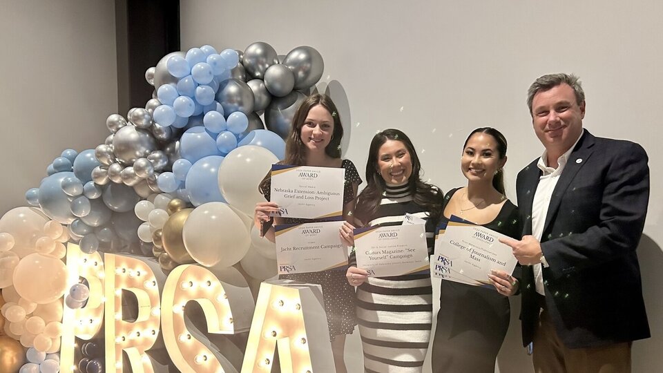 Paper Anvil Award-winners and CoJMC students (from left) Madalyn Backes, Ryann Zechmann and Erica Napuli pictured with Truescope President Todd Murphy.