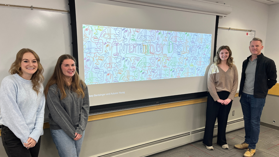 Bailey Lauerman judges Sarah Northcutt (far left) and Casey Stokes (far right) with Diversity Design Challenge winners (from left to right) Autumn Young and Kelsey Bentzinger.
