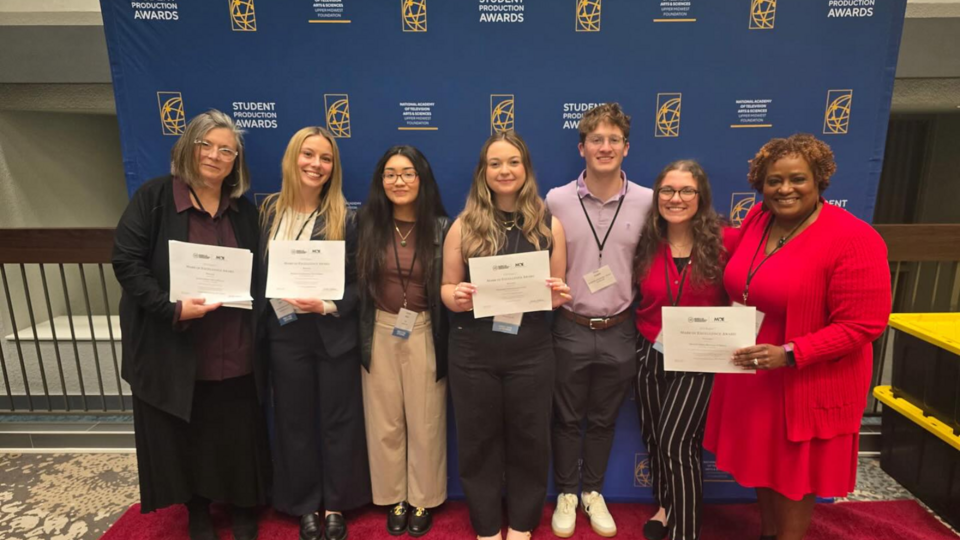 students and faculty at mark of excellence awards