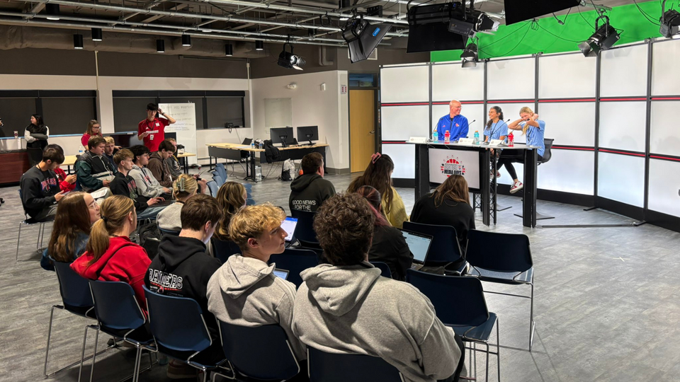 students interview basketball team in meier studio