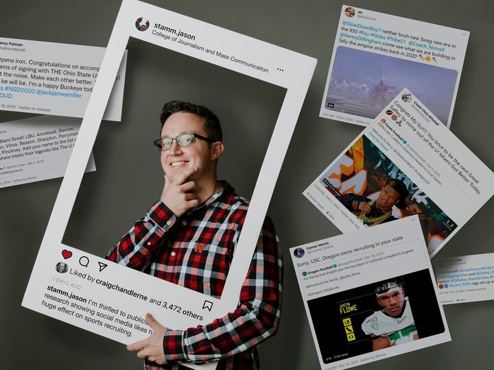 Man stands behind card board reresentation of a social media post