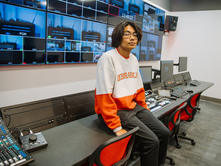 Jay Quemado is photographed in the broadcasting studio.
