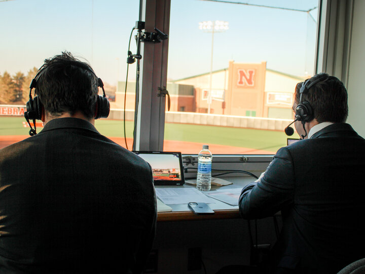 College of Journalism students broadcasting a Nebraska softball game