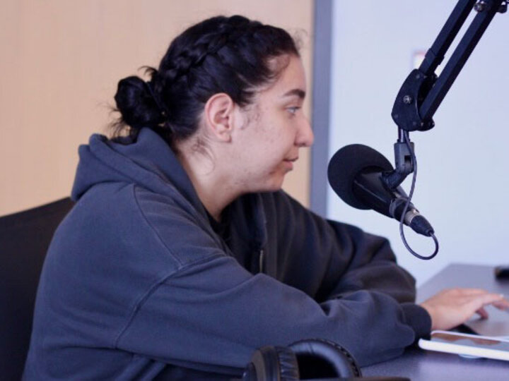 Bella Lucero in the podcast studio