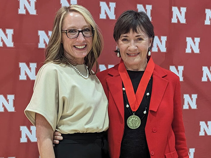 Dean Shari Veil stands next to Jane Olson