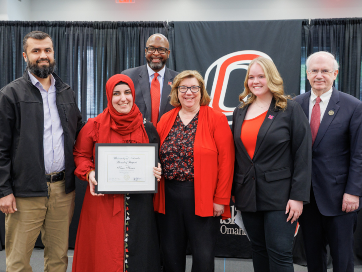 Karez Hassan receives the Kudos award from the University of Nebraska Board of Regents.
