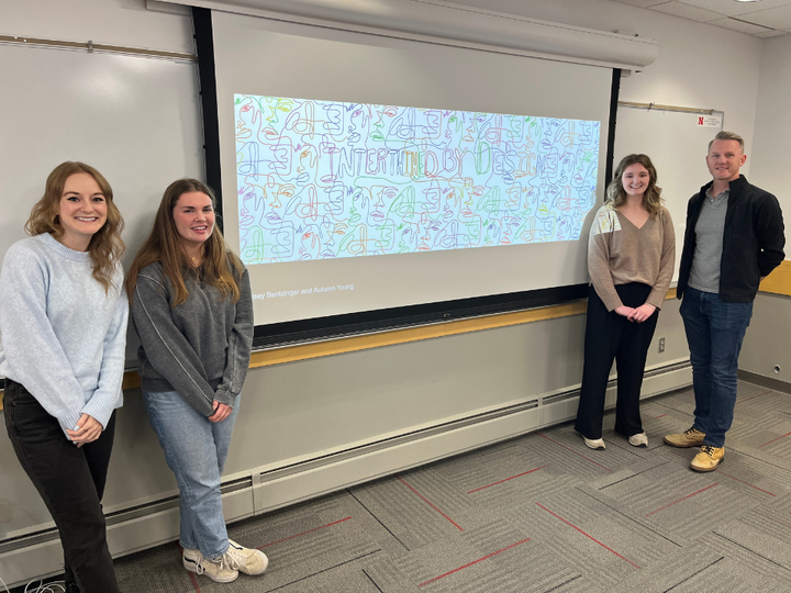Bailey Lauerman judges Sarah Northcutt (far left) and Casey Stokes (far right) with Diversity Design Challenge winners (from left to right) Autumn Young and Kelsey Bentzinger.