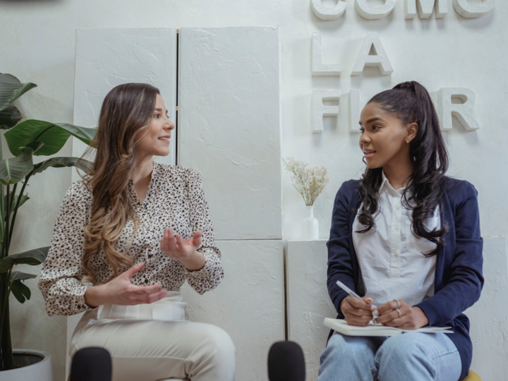 two people talking in an office