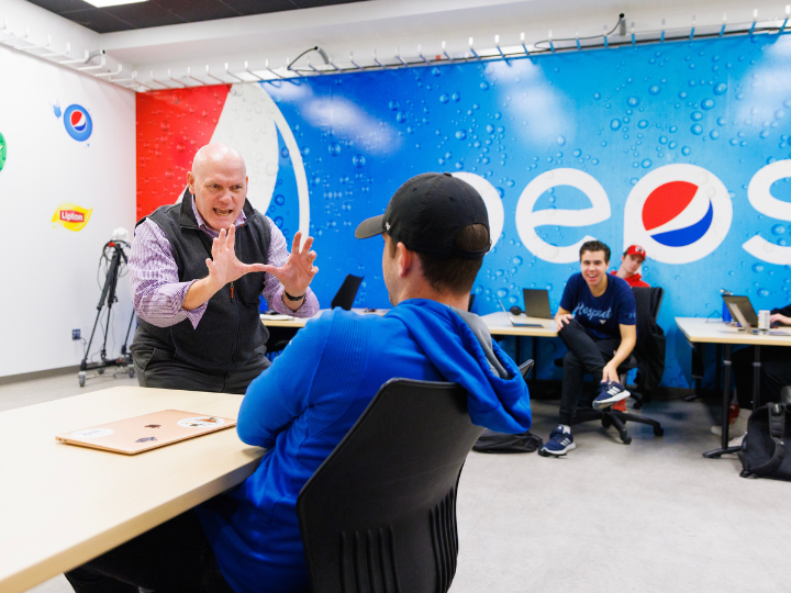 John Shrader teaches class in the Pepsi Unlimited Sports Lab.