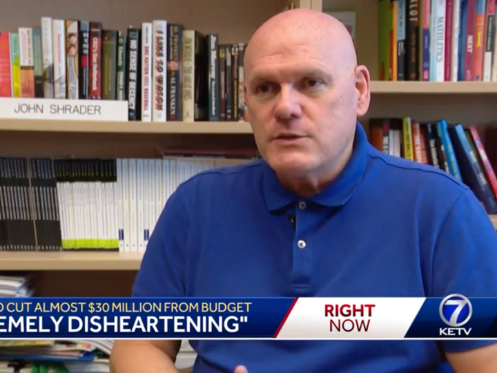 John Shrader being interviewed in his office