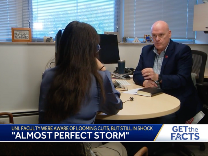 John Shrader being interviewed in his office