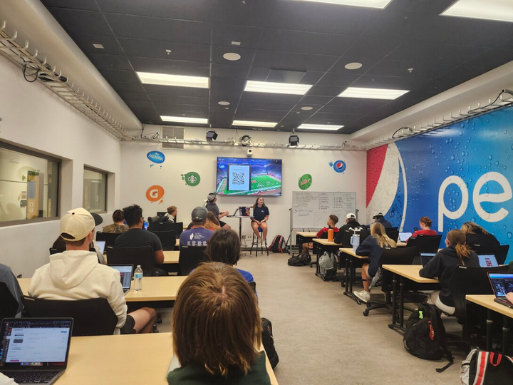 An UNLimited Sports class is held in the Pepsi Lab of the College of Journalism and Mass Communications.