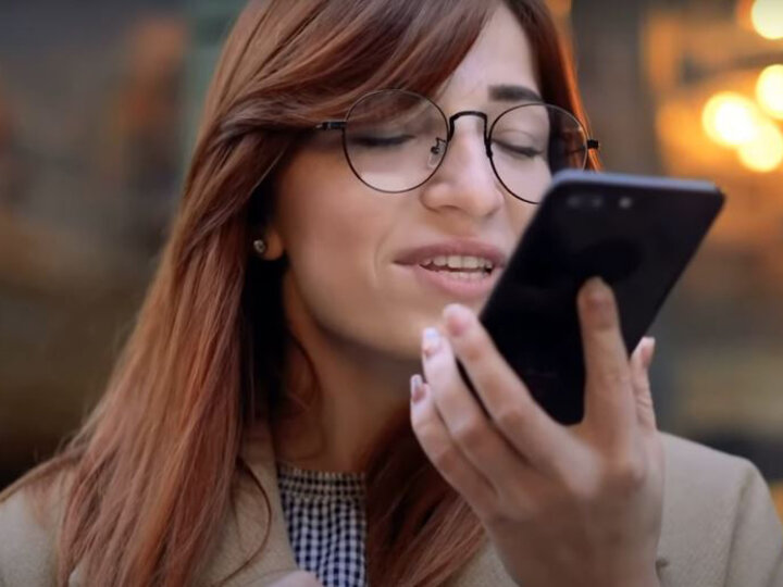 A woman looking at her phone