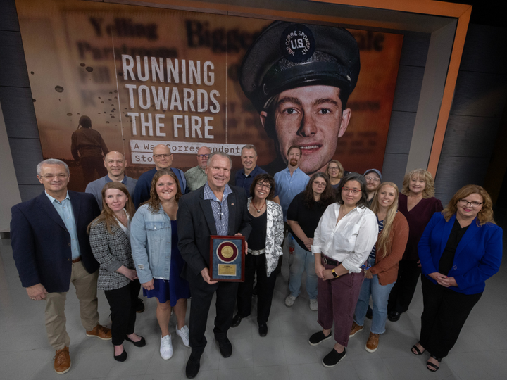 The team behind "Running Towards the Fire"