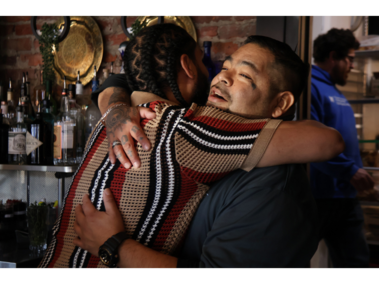 Embracing the Journey of Building Community  LaRue Marcos and his coworker have a heart-to-heart before a shift at 3:04 p.m. on Saturday, Feb. 21, 2026. While hard work is important, Marcos always makes time to speak to and bond with the program’s members. 