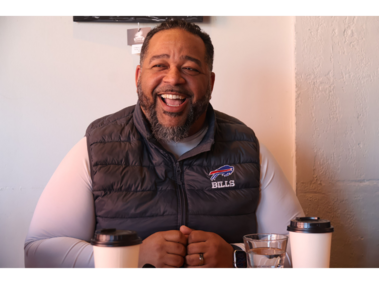 6.	Clifton Hobbs laughs as he shares stories about his youth on Feb. 21, 2026, at Mo Java Coffee Shop in Lincoln, Nebraska. Hobbs said he wants to make faith accessible to all groups after negative experiences as a young Christian. “When I was a kid, I couldn’t even go to the drive-in because that’s where the pastor thought people got pregnant out of wedlock,” Hobbs said. 