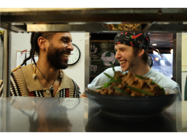 Short-Term Interactions Leaving Long-Term Impact LaRue Marcos, left, shares a laugh with a program student, right, in the kitchen at 2:47 p.m. on Saturday, Feb. 21, 2026. Despite what circumstances brough them to Ooh De Lally, the workspace remains a judgement-free space where everyone is valued. (Photo by/Hannah E. Herrera)