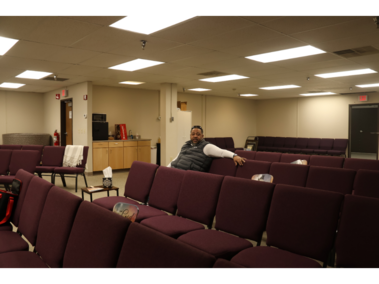 Clifton Hobbs sits in his congregation's chairs as he contemplates the following day's service at Glory Tabernacle church on Feb. 21, 2026. Hobbs expressed concern regarding the shifting religious climate. “They're using the Bible to ostracize people in the LGBTQ community and immigrants, and it won't be long until they ostracize me as a Black man married to a white woman,” Hobbs said. 
