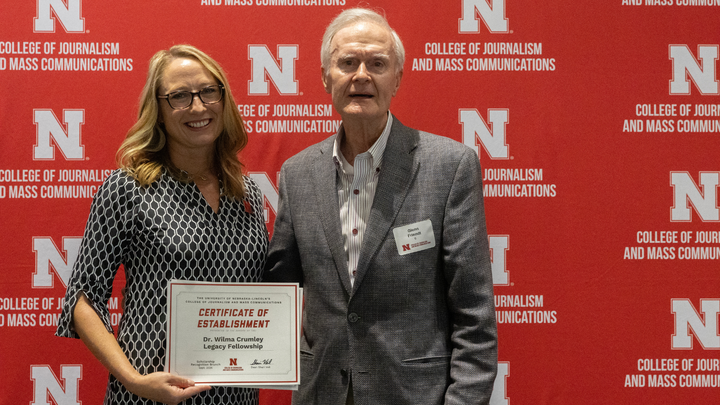 Glenn Friendt receives a Certificate of Establishment for the Dr. Wilma Crumley Legacy Fellowship.