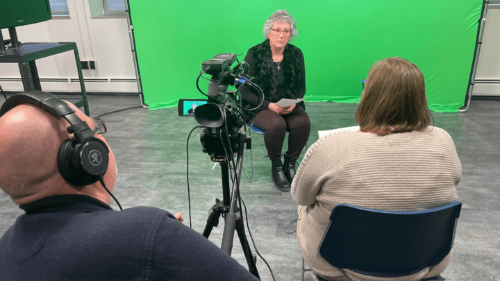 people using a green screen