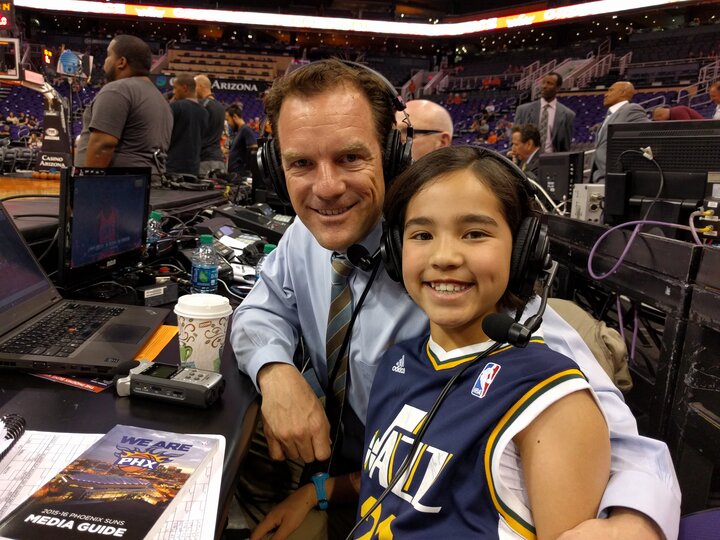 Arden and her dad at a Utah Jazz game.