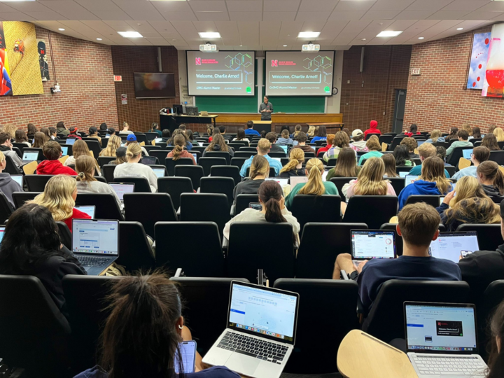 Charlie Arnot gives a presentation in Henzlik Hall.