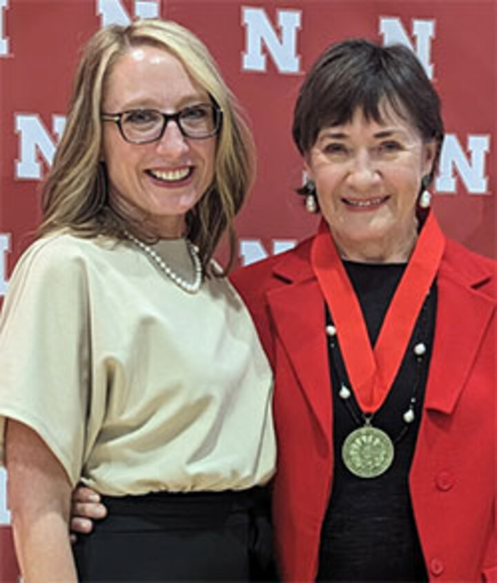 Two women pose together